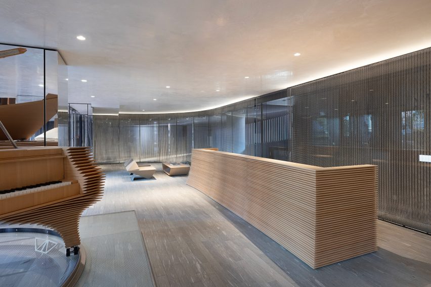 Lobby with sculptural wooden desk