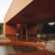 Balzar Arquitectos nestles copper-toned home into Valencian olive grove
