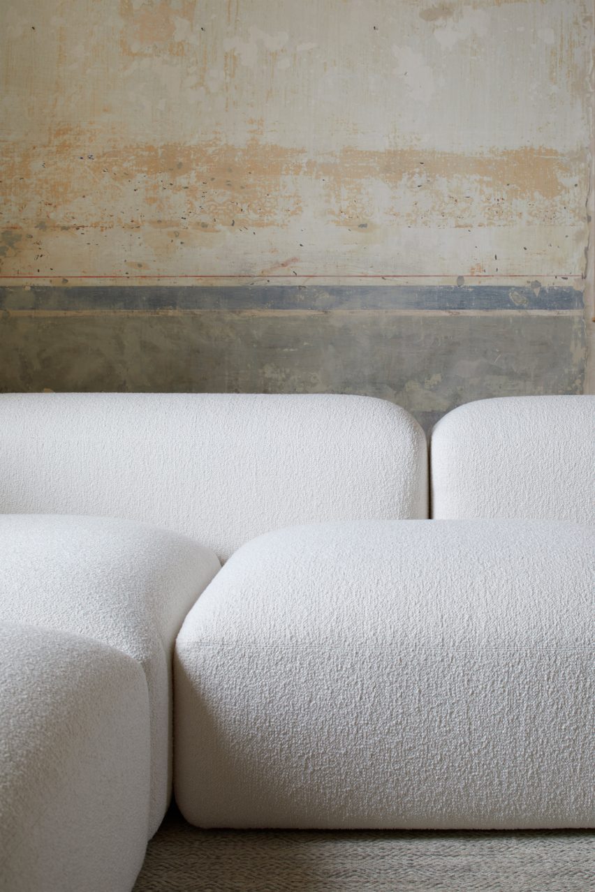 Detail of white sofa in living space
