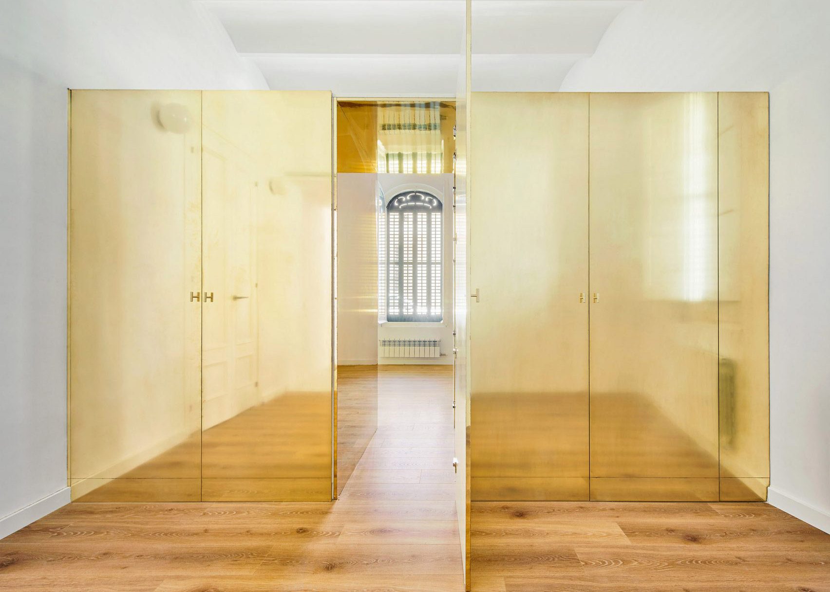 Golden wardrobes in The Magic Box Apartment 