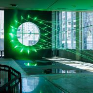 Gallery space with green lasers at the Hammer Museum