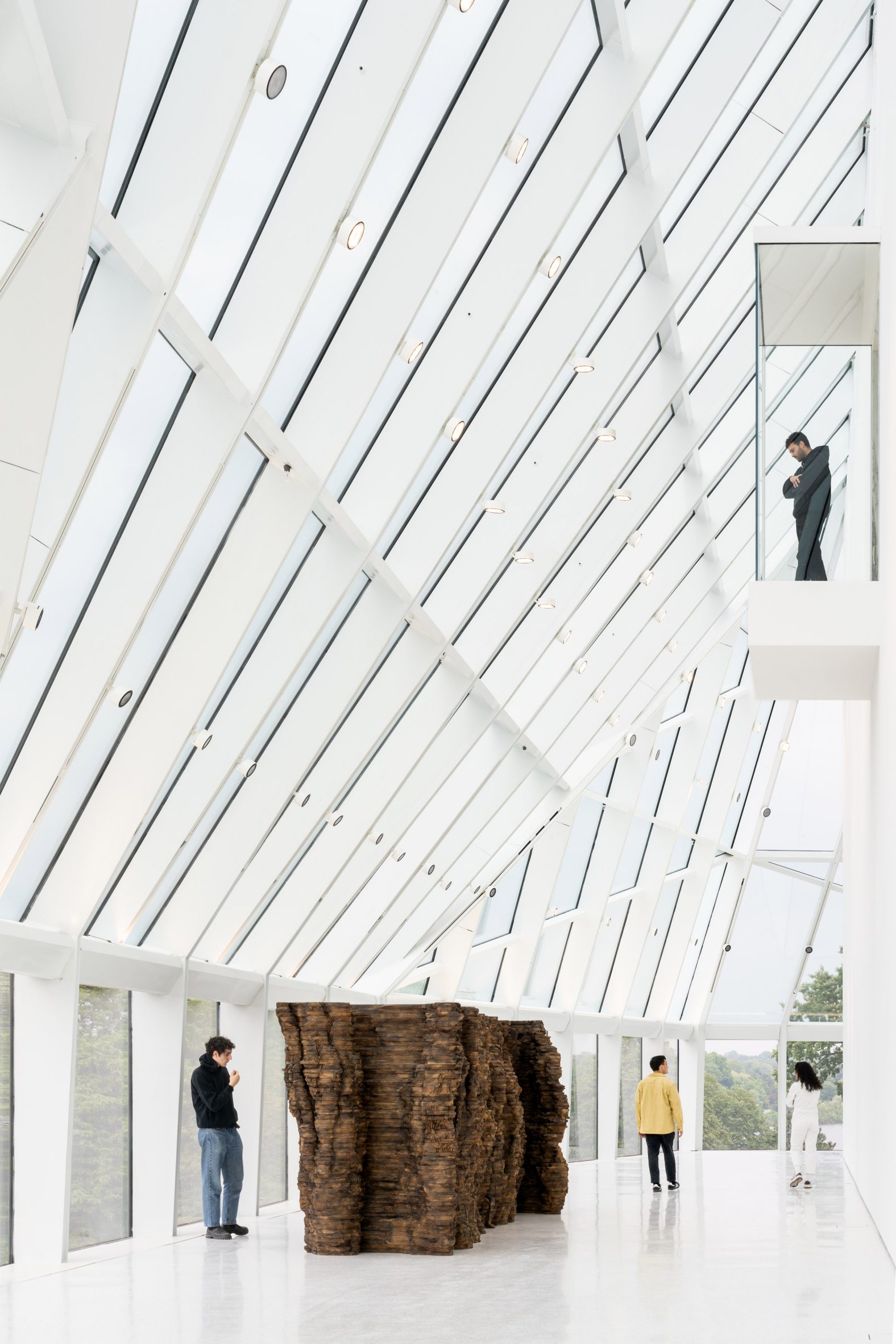 Glass interior of OMA-designed museum extension