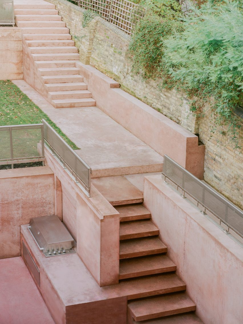 Pink stairs outside of Pigment House by Unknown Works