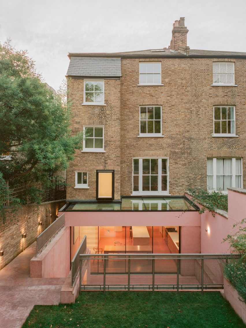 Rear of Victorian home with pink extensions