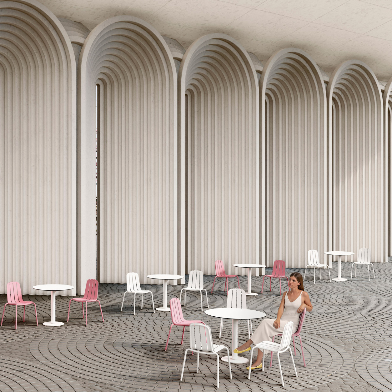 Models sitting on white and pink chairs in front of curved archways