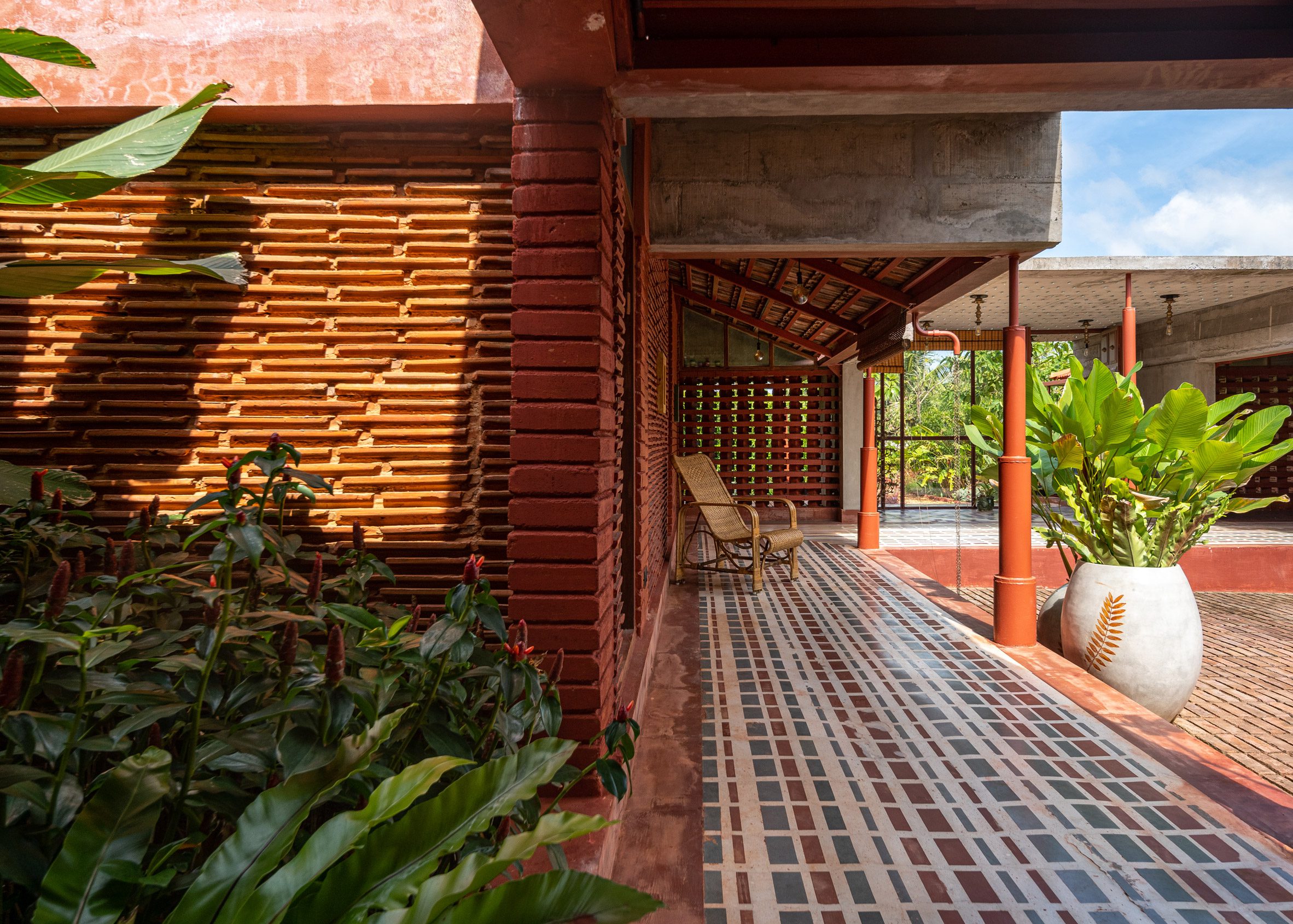 Walls made from deep red brick, stacked mangalore tiles