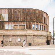 Recycled railway sleepers clad creative centre beside Camden's Roundhouse