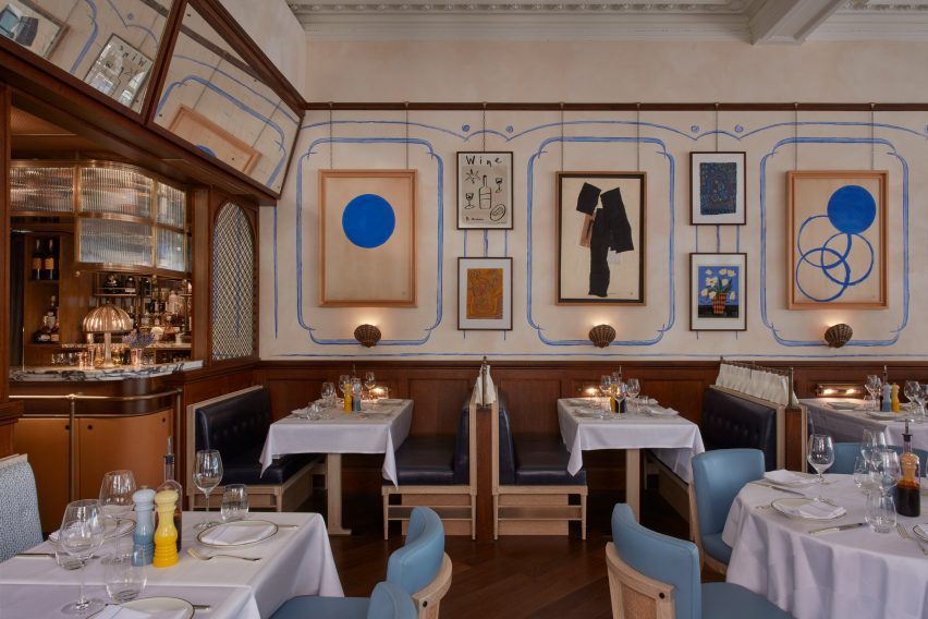French-style Socca restaurant in London with wood panelling and hand-painted murals