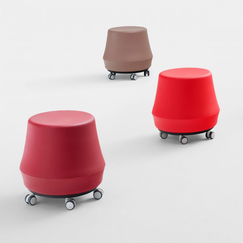 Three red and brown Stump stools by Derlot with wheels