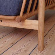 Detail of back of sofa with wooden spokes visible