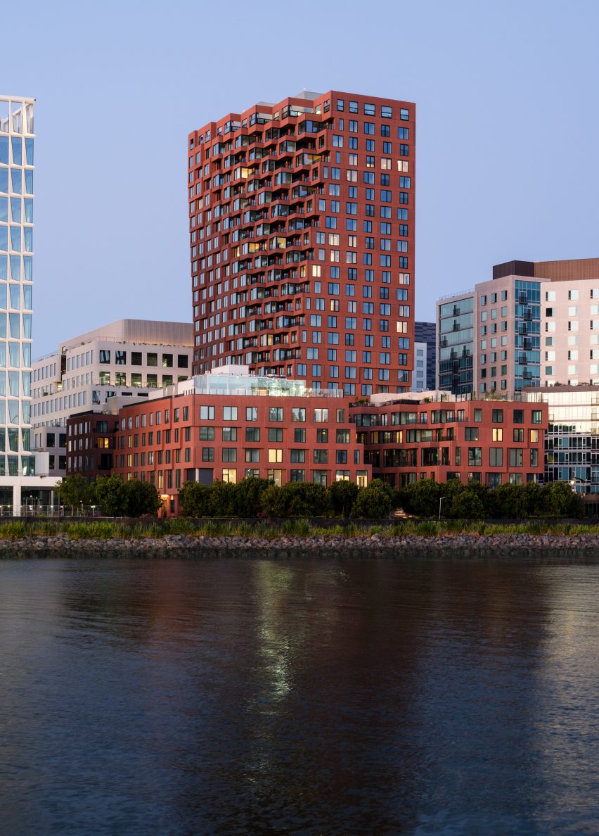 View of water and red-brown high rise