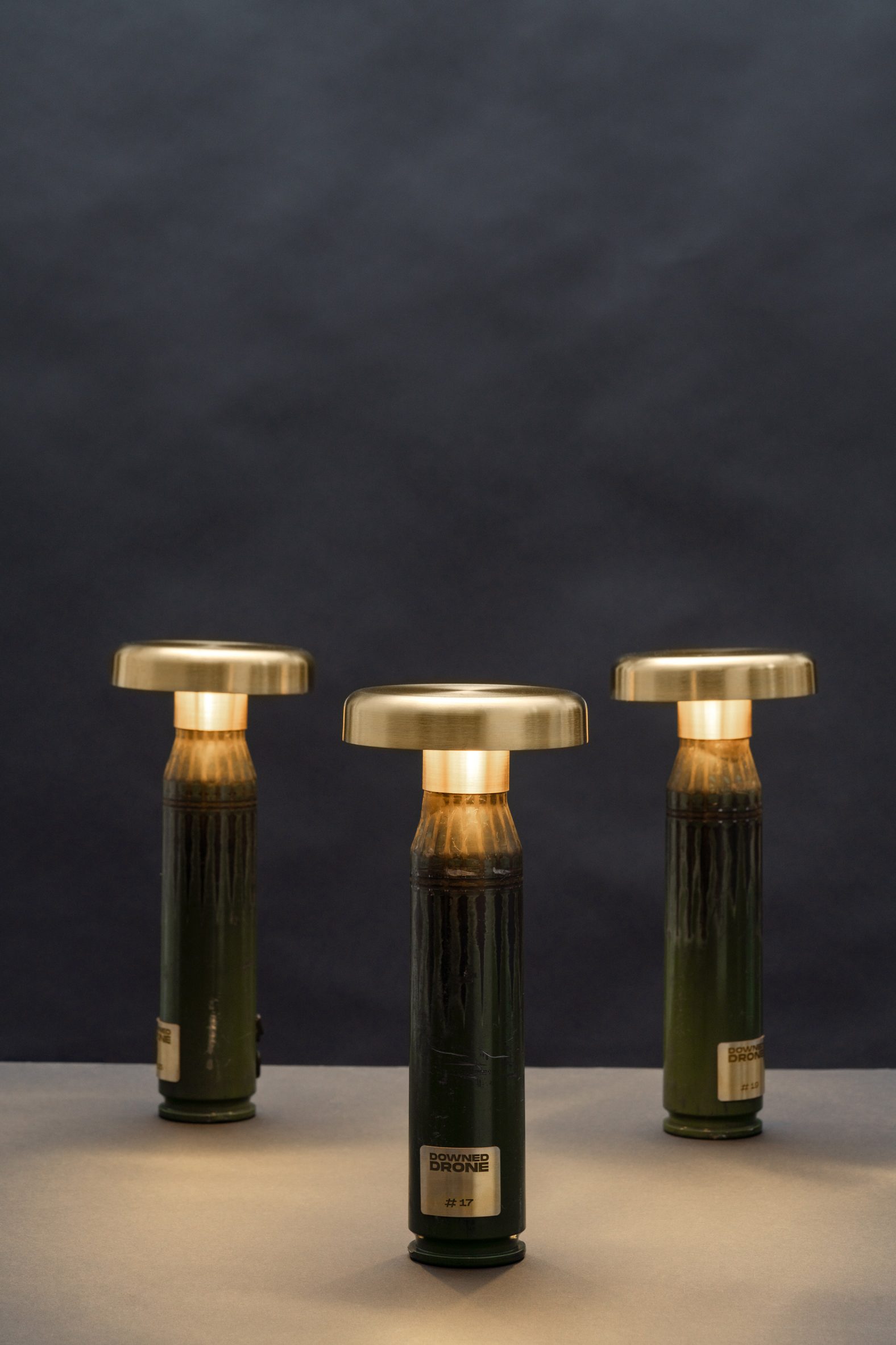 Green lamps made from shell casings