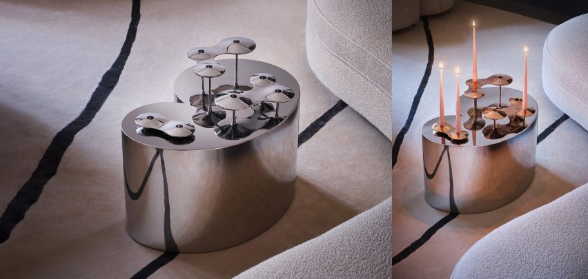 Photograph showing metallic candle holder on coffee table