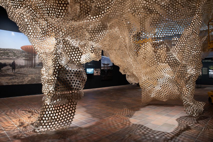 Photograph of the mesh installation informed by the inside of a cave