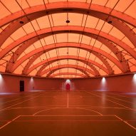 An underground sports complex with a translucent roof