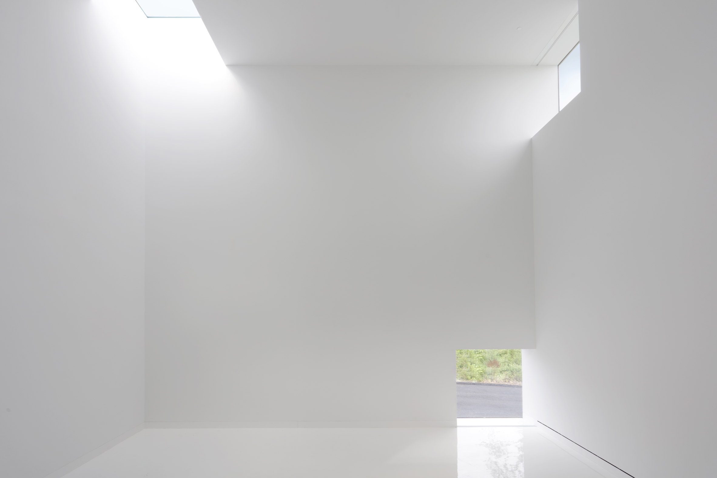 White light in white gallery space