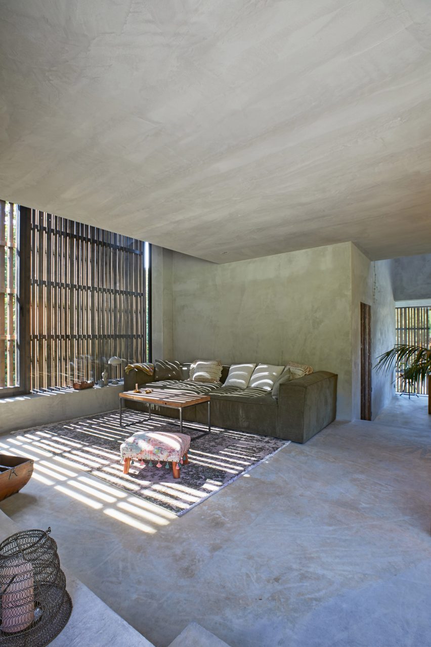 Living room with concrete floor inside Residential Barn in a Hamlet Zone