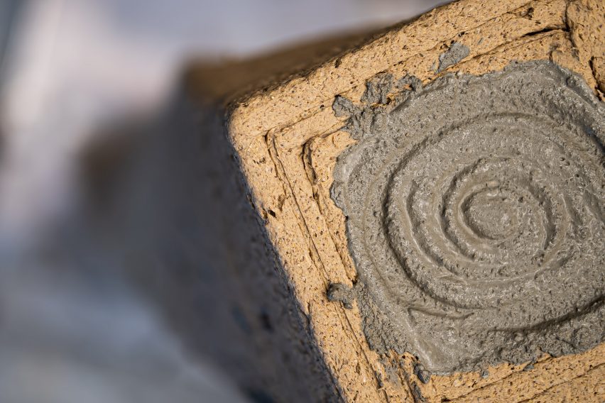 Concrete poured into a a column of sawdust casting