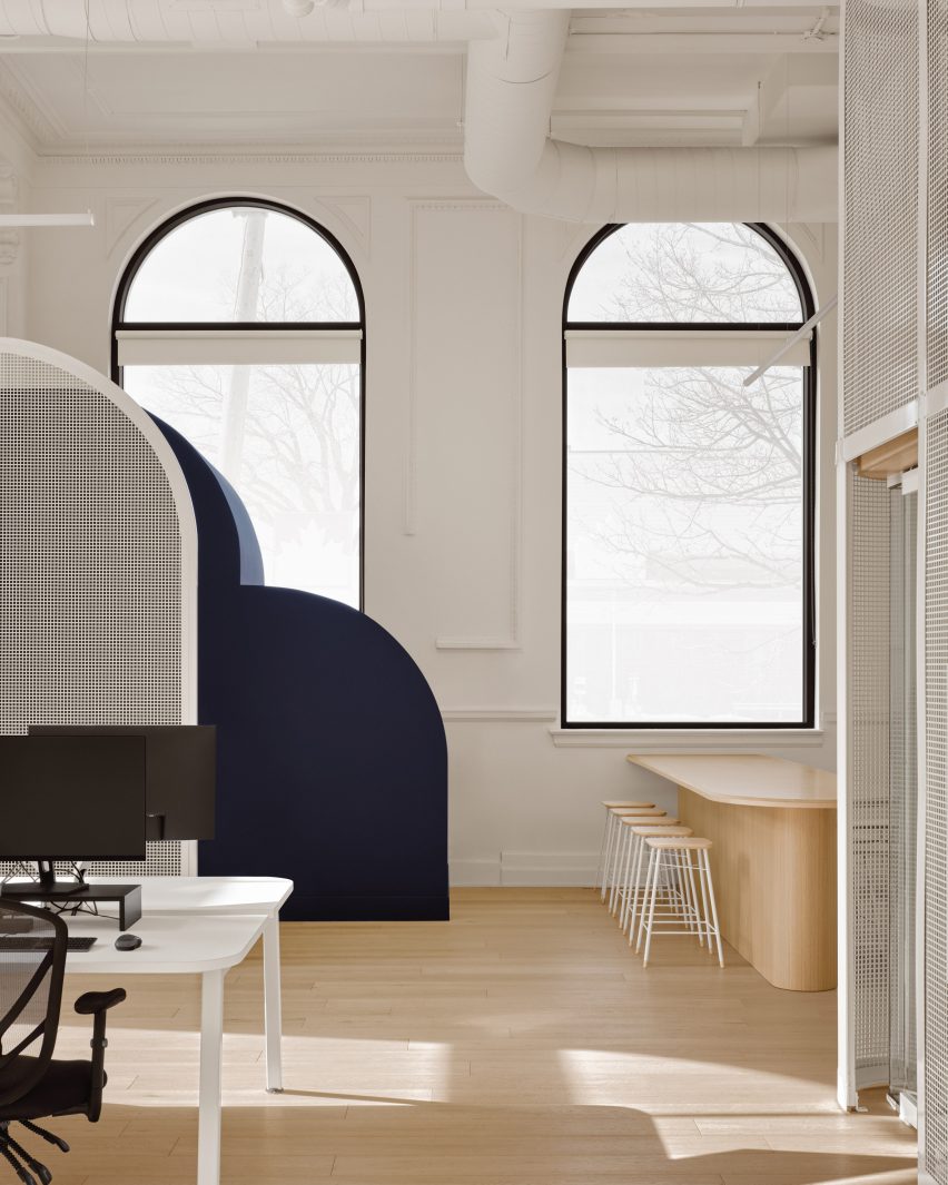 Large arched windows in office space