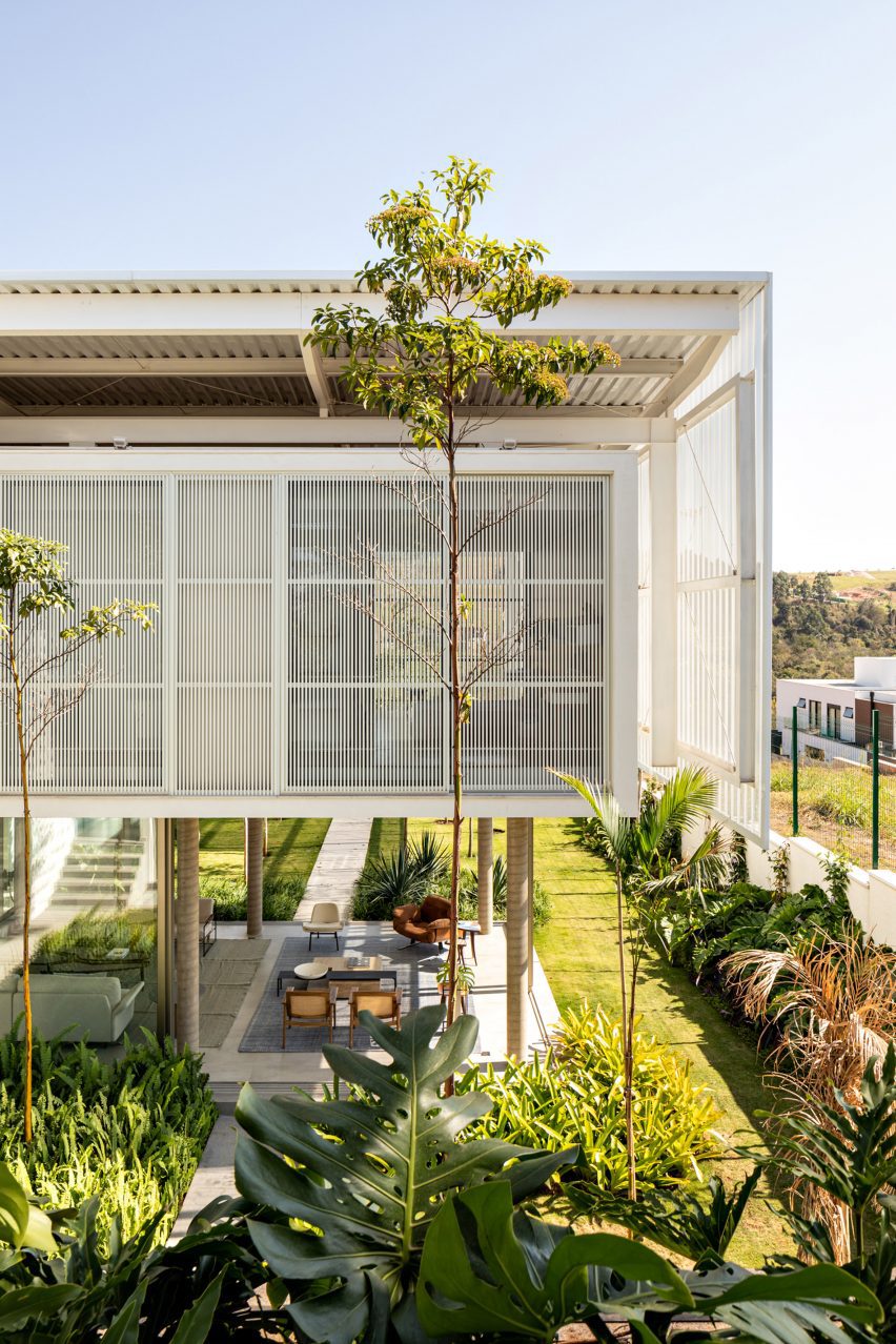 A house in Brazil with screened walls made of metal