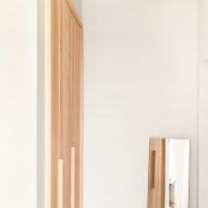Cloudy Outlines apartment by Note Design Studio features Douglas fir joinery