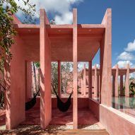 Coyote Arquitectura uses repetitive red forms for Tulum housing block