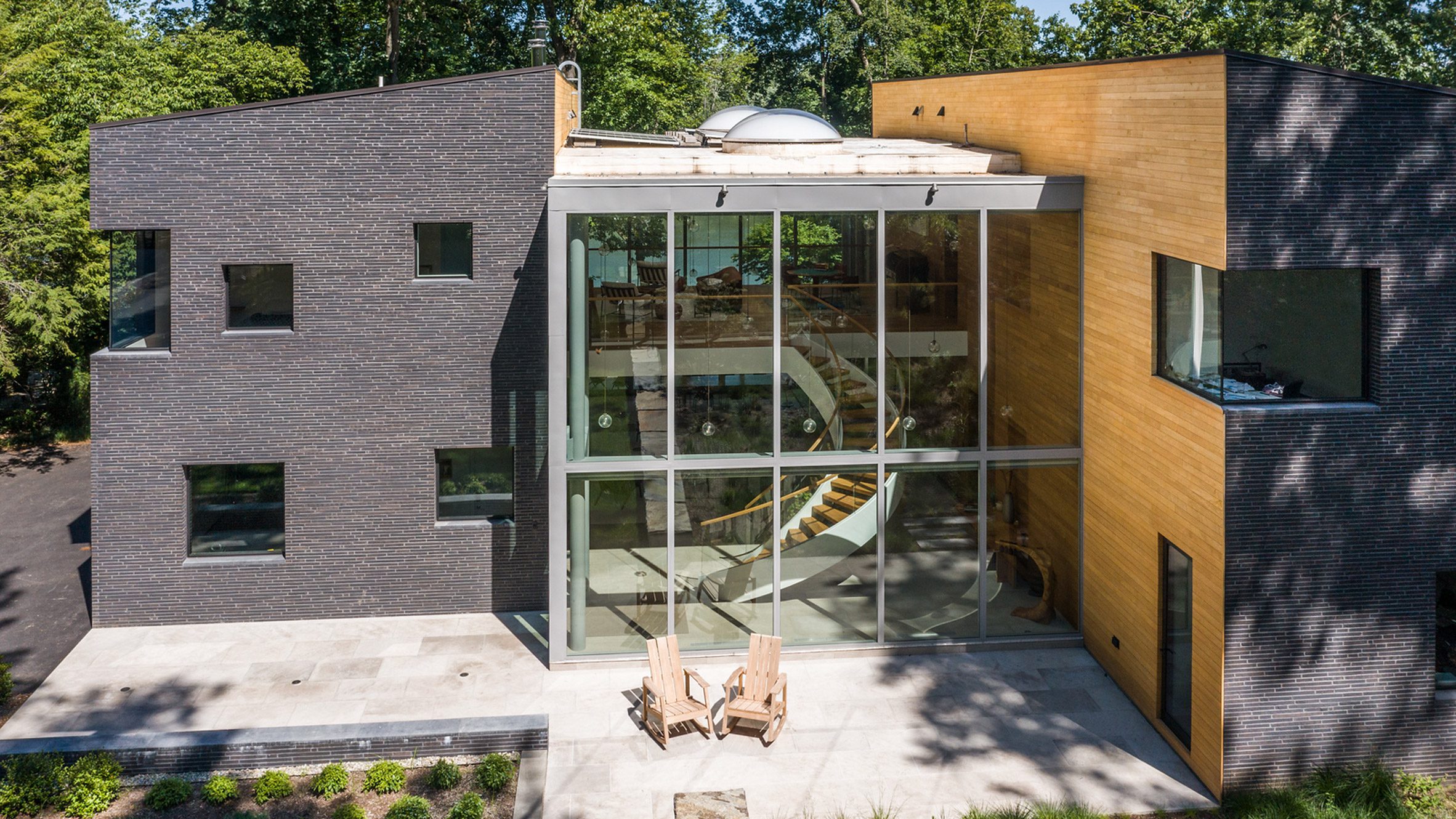 La Clairiere residence clad in black Glen-Gery bricks - Vimarsana News