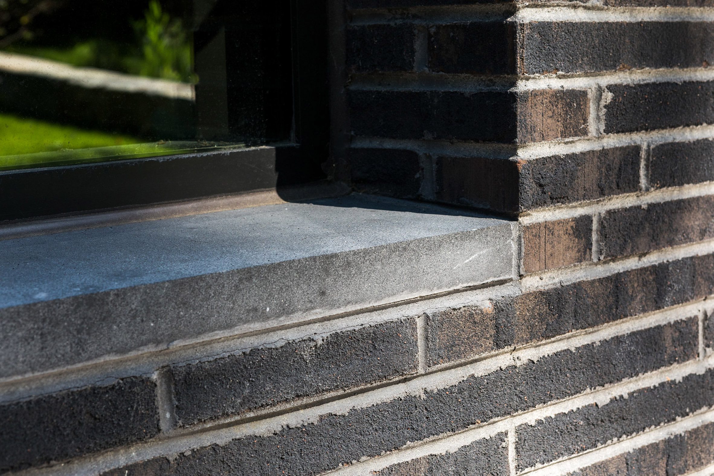 Textured black bricks by Glen-Gery