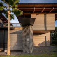 Operable screens wrap beachfront house in Hawaii by Olson Kundig