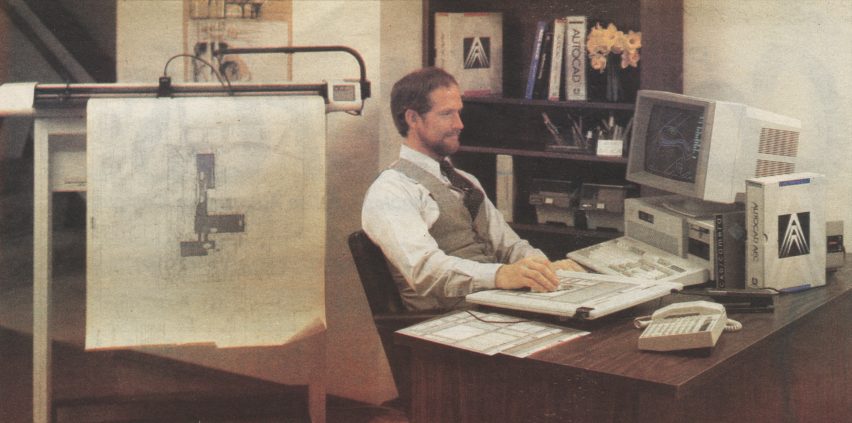 An old photo of a man using AutoCAD