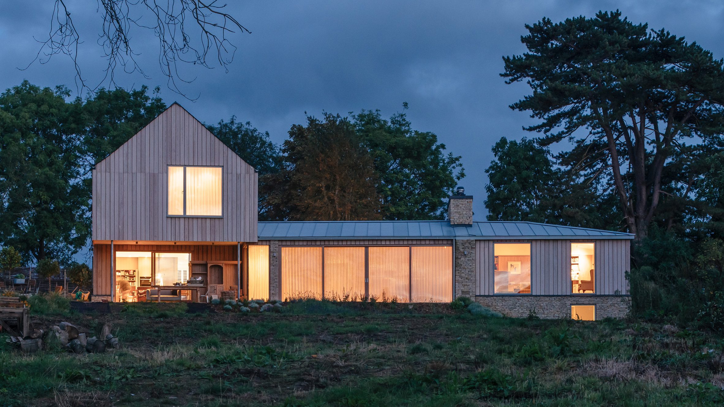 Stone and larch clad Cotswolds House by Oliver Leech Architects - Vimarsana News