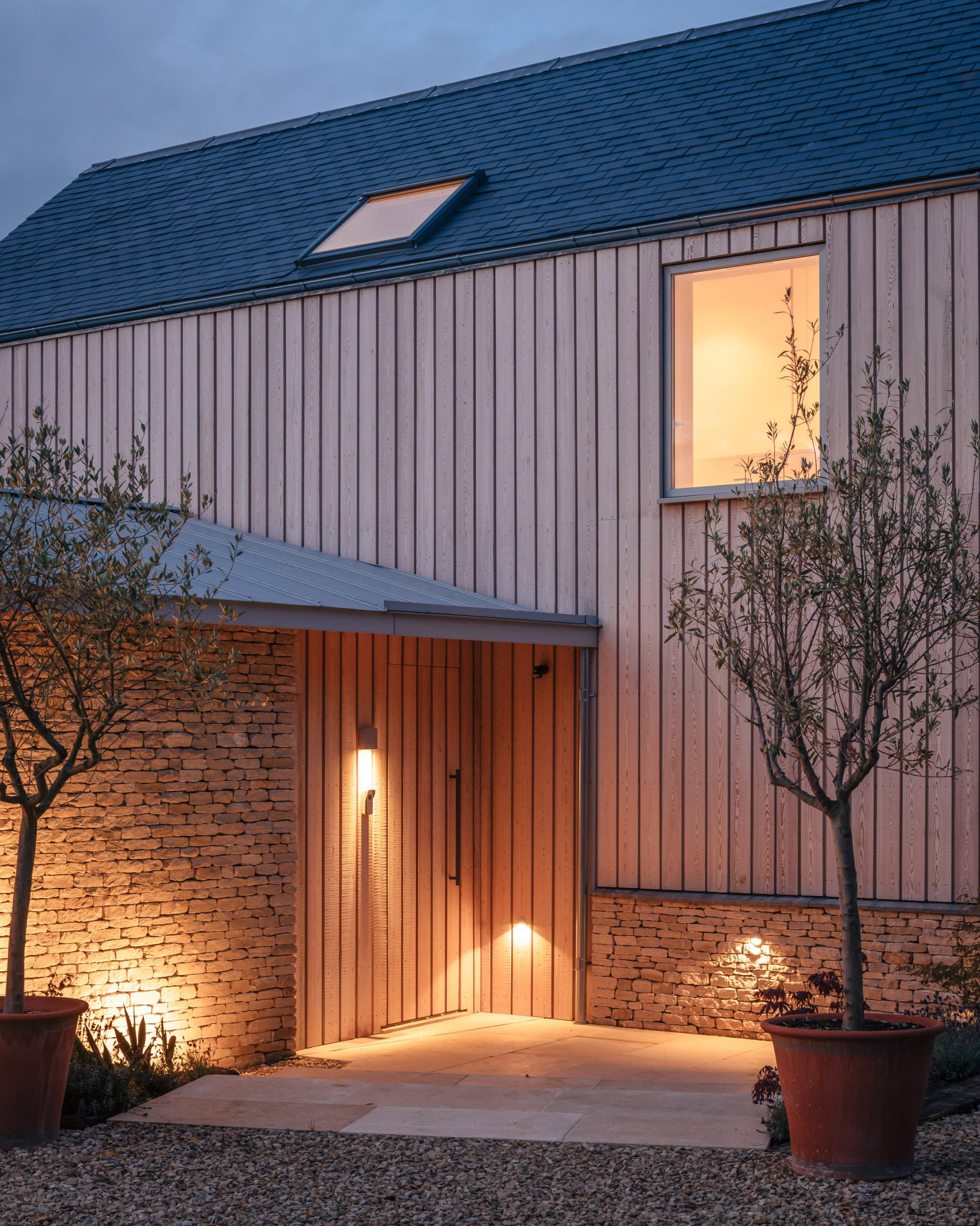 Larch-clad entrance to Cotswolds House