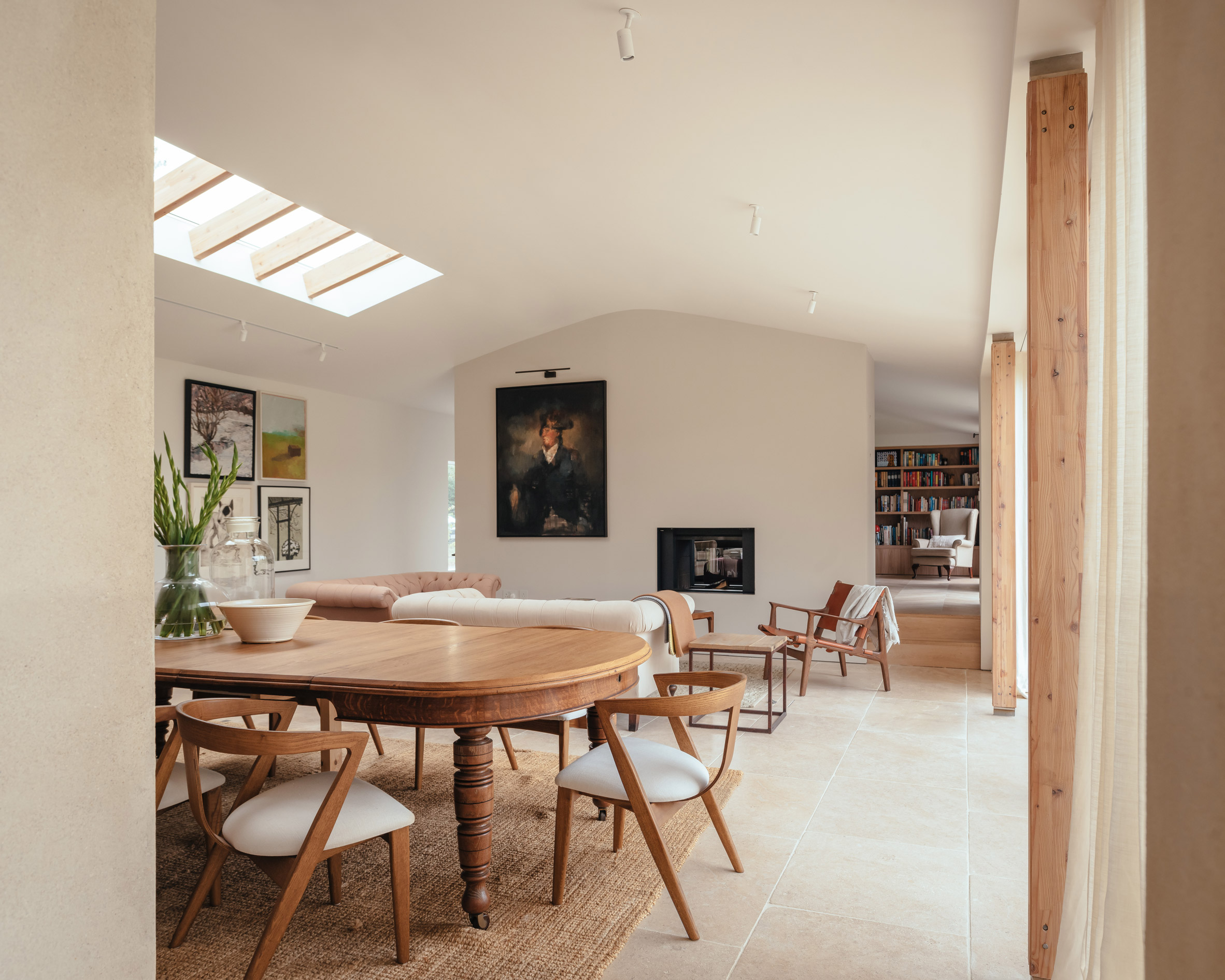 Living and dining area inside Cotswolds House by Oliver Leech Architects 