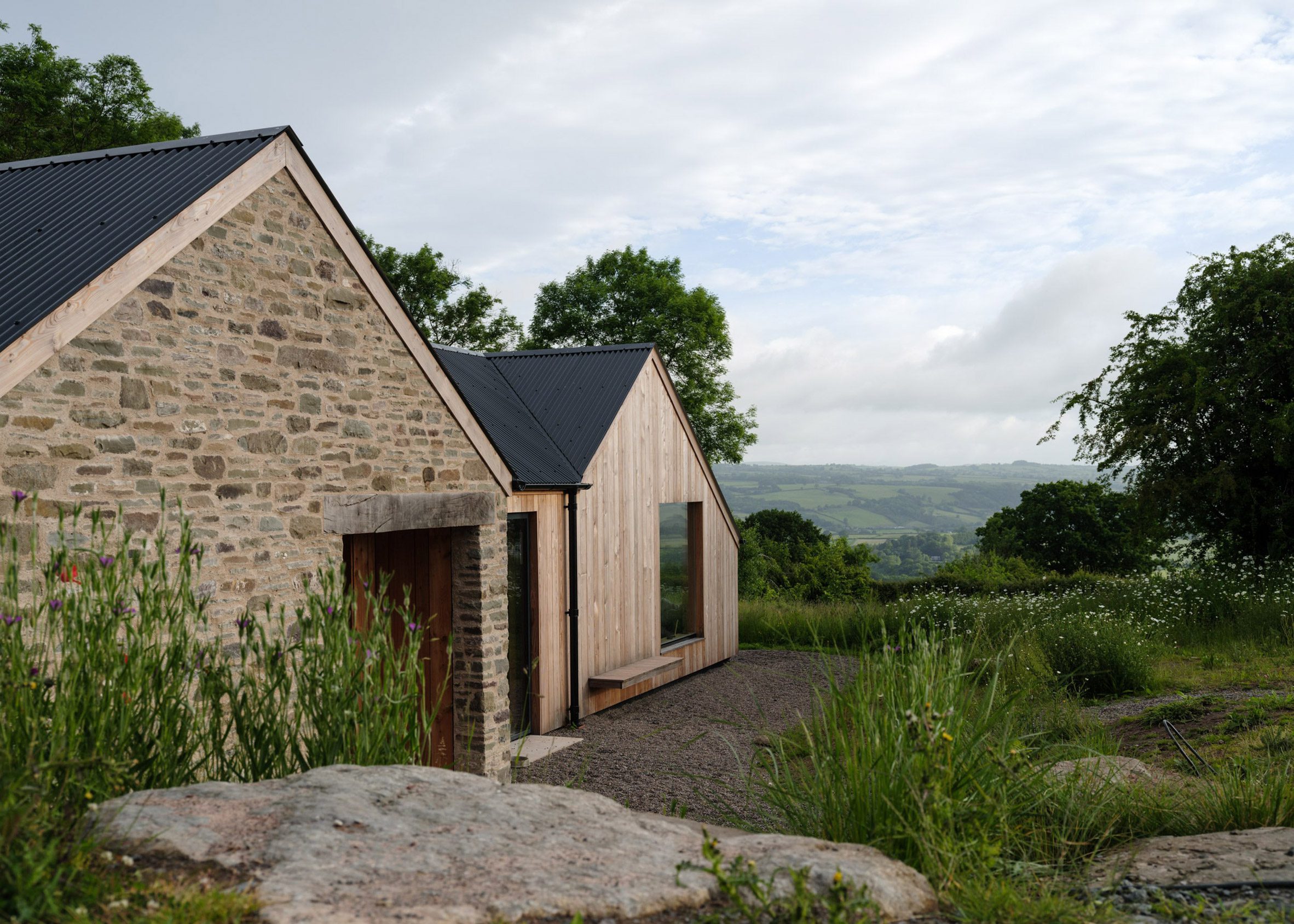 Extension attached to cottage in rural Wales