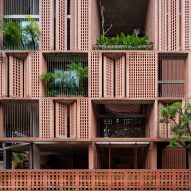 Perforated brickwork wraps Premier Office in Vietnam by Tropical Space