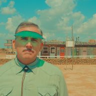Actor Steve Carrell in a desert in Wes Anderson's Asteroid City