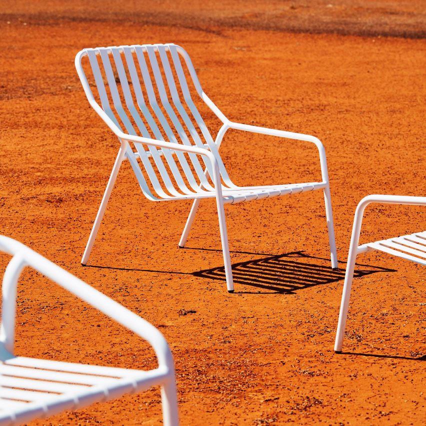 White seating on orange earth in outback