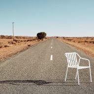 White chair in outback on road