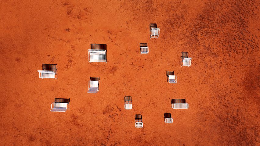 Aerial shot of white seating on orange ground