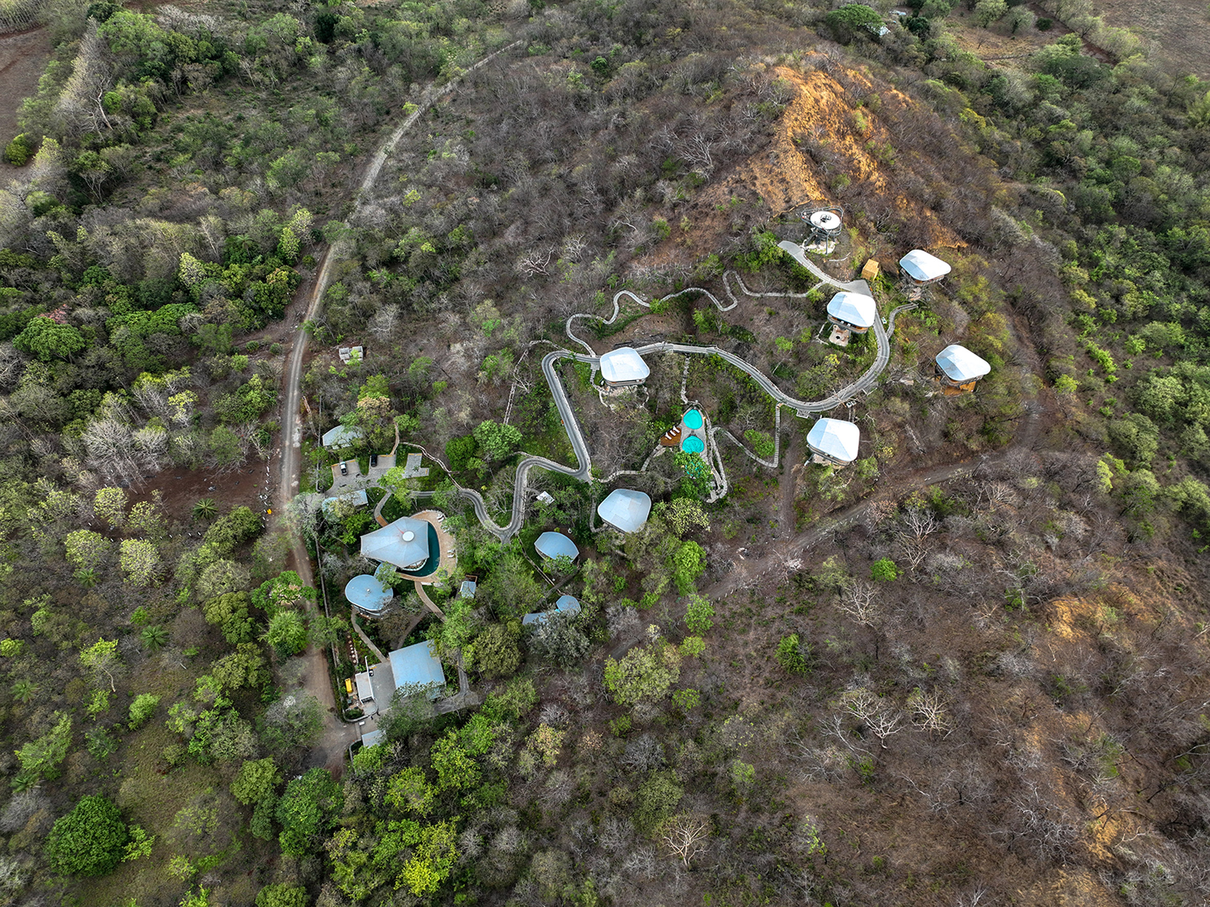 Treehouse-style pods built into the Costa Rican landscape