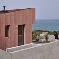 Studio Weave nestles pink Seosaeng House into South Korean hillside