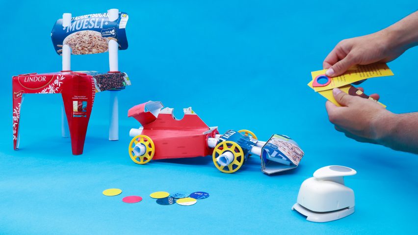Toy chair and car created from old cereal boxes using a gadget made with a hole punch and 3D printed connector
