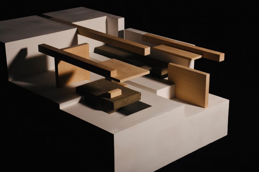 Blocky model showing interior layout with wooden elements on black backdrop