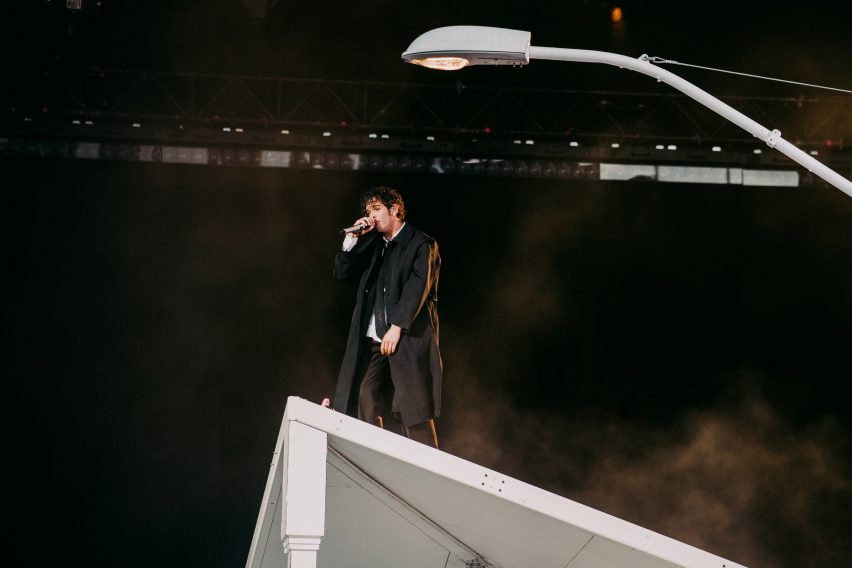 Matty Healy on the roof of the At Their Very Best set