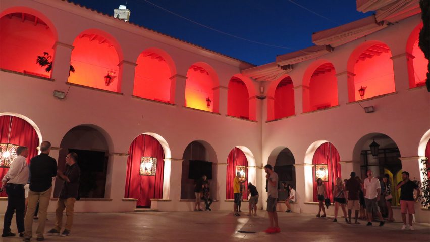 Photo of a building with red lights at BLOOP Festival