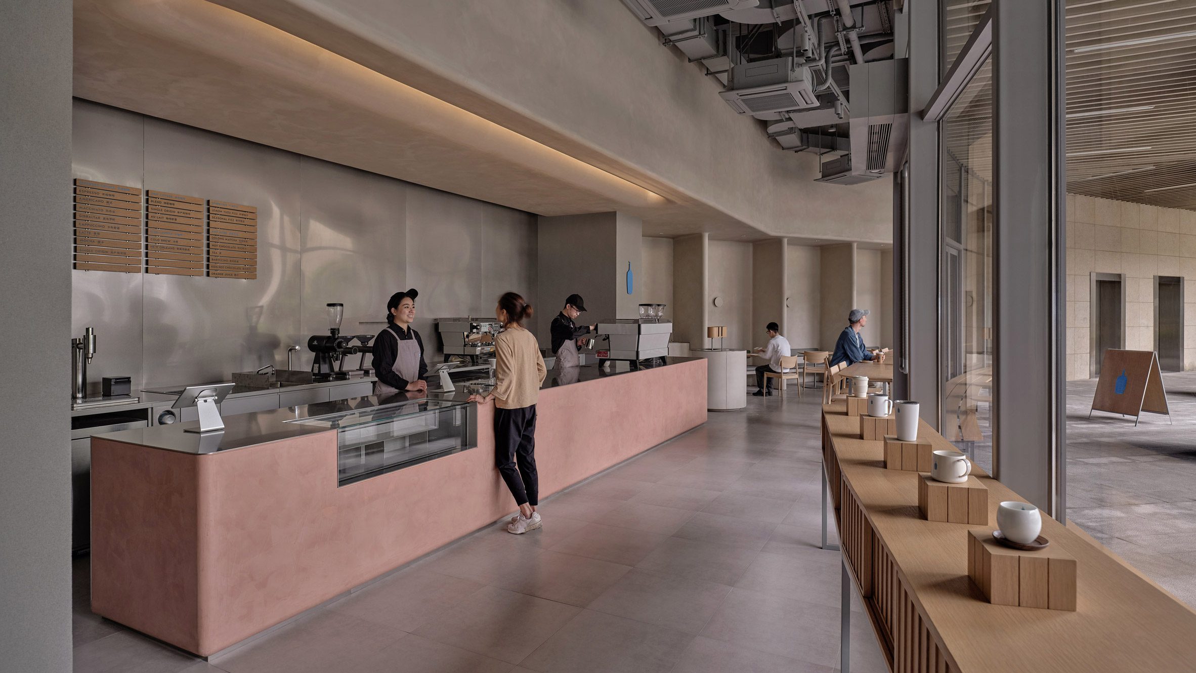 Traditional Chinese roof tiles decorate Blue Bottle Coffee shop in Shanghai