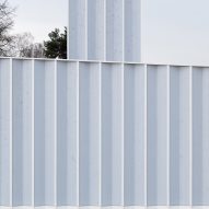 Pleated blue timber facade on a workshop by Cabinet