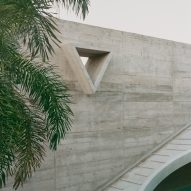 A triangular cut out in a concrete wall