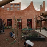 Arched brick forms enliven London children's centre by Adam Khan Architects