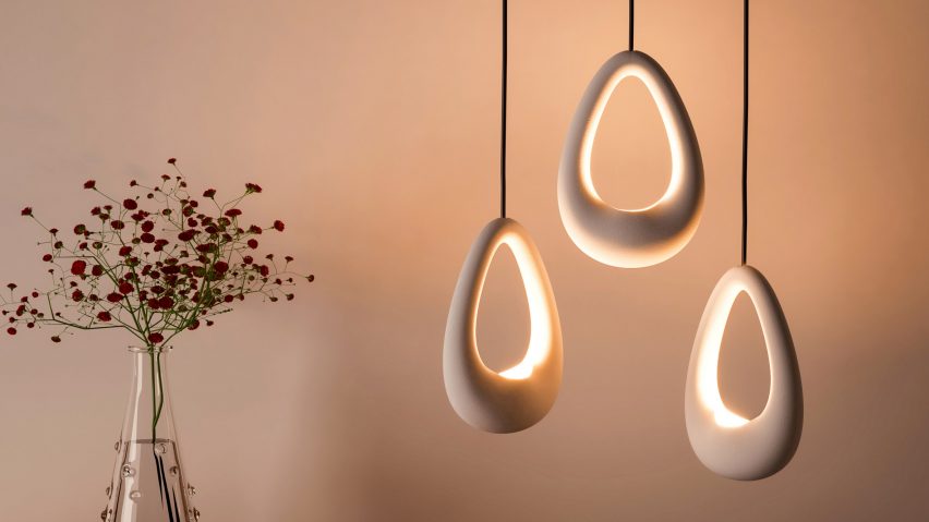 Photograph showing ceramic lights in front of white wall